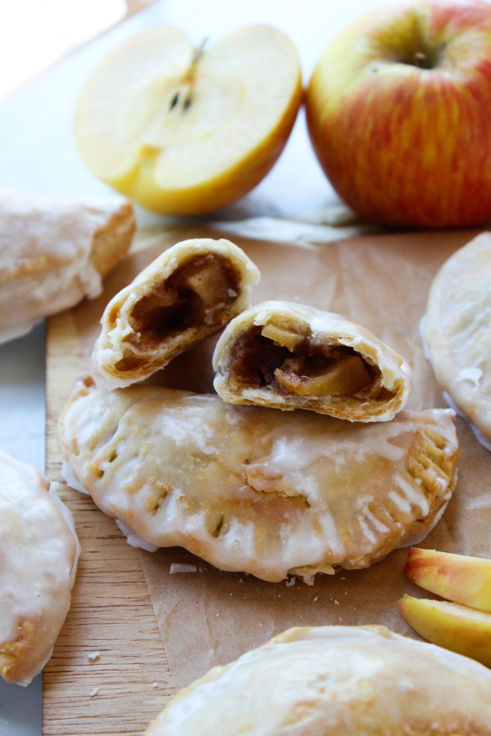 Close‑up of apple hand pie showing warm cinnamon‑apple filling