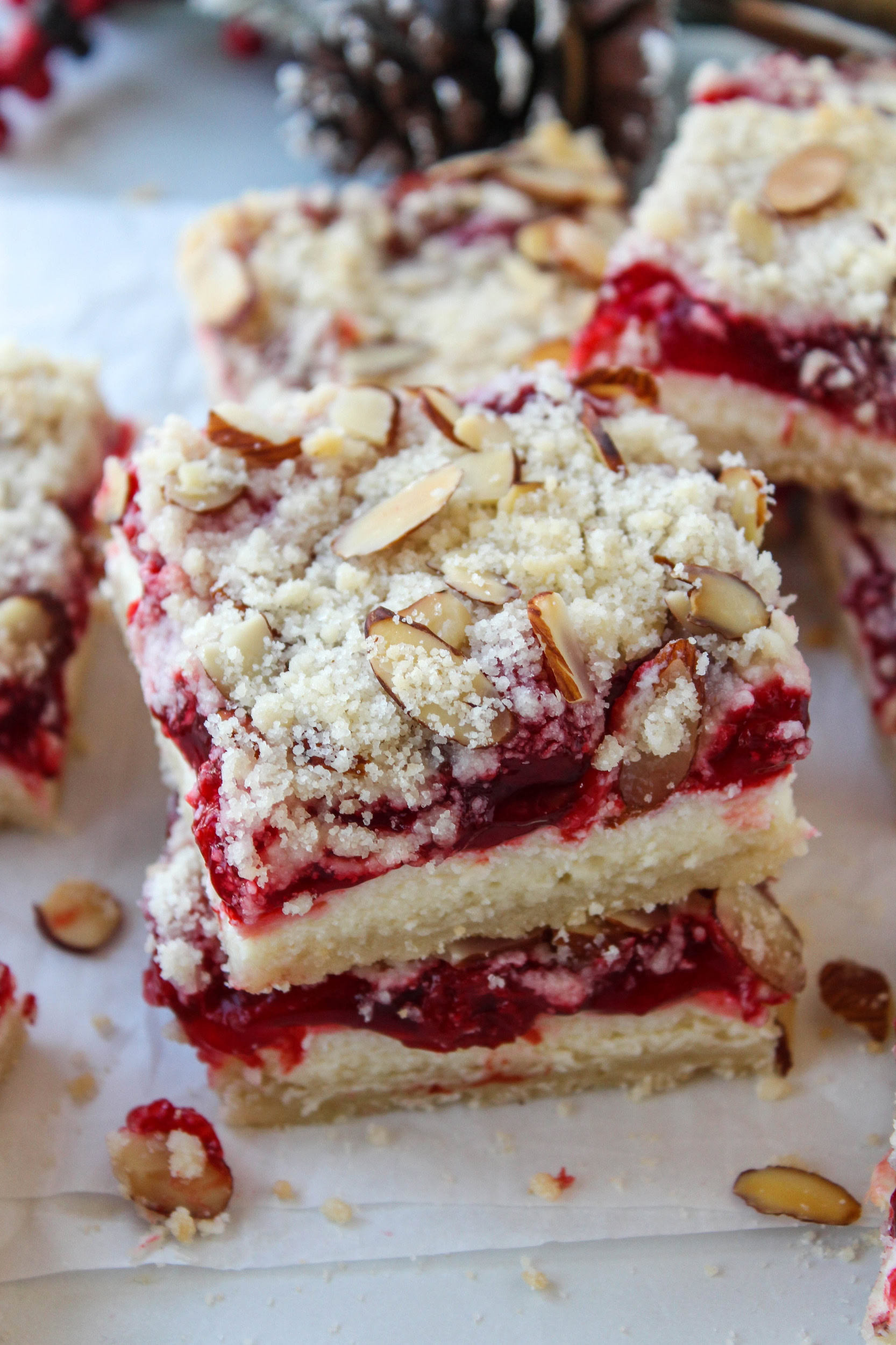 Homemade Christmas cheesecake bars with a buttery crust and rich cheesecake layer