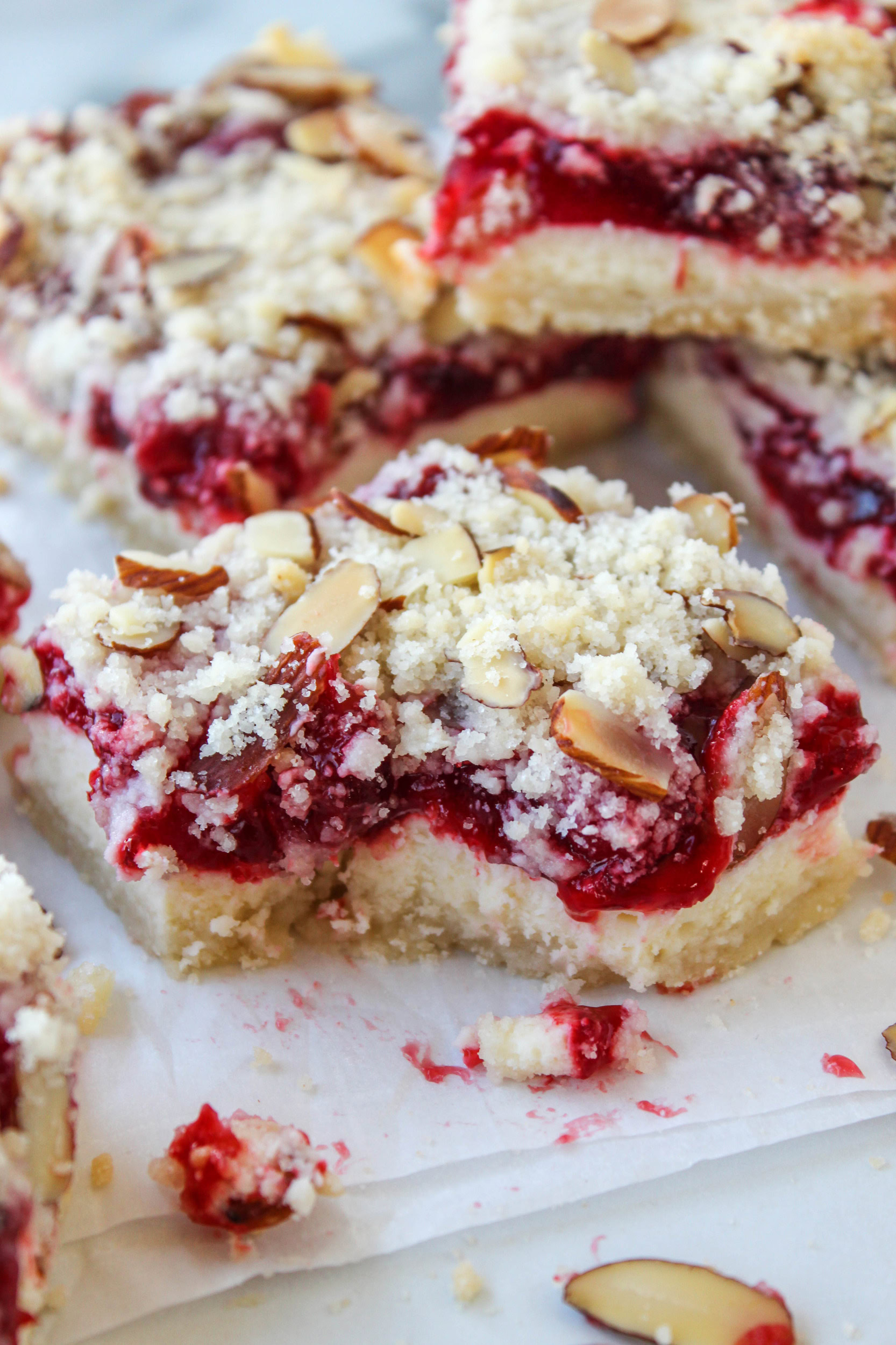 Holiday cheesecake squares on a serving platter