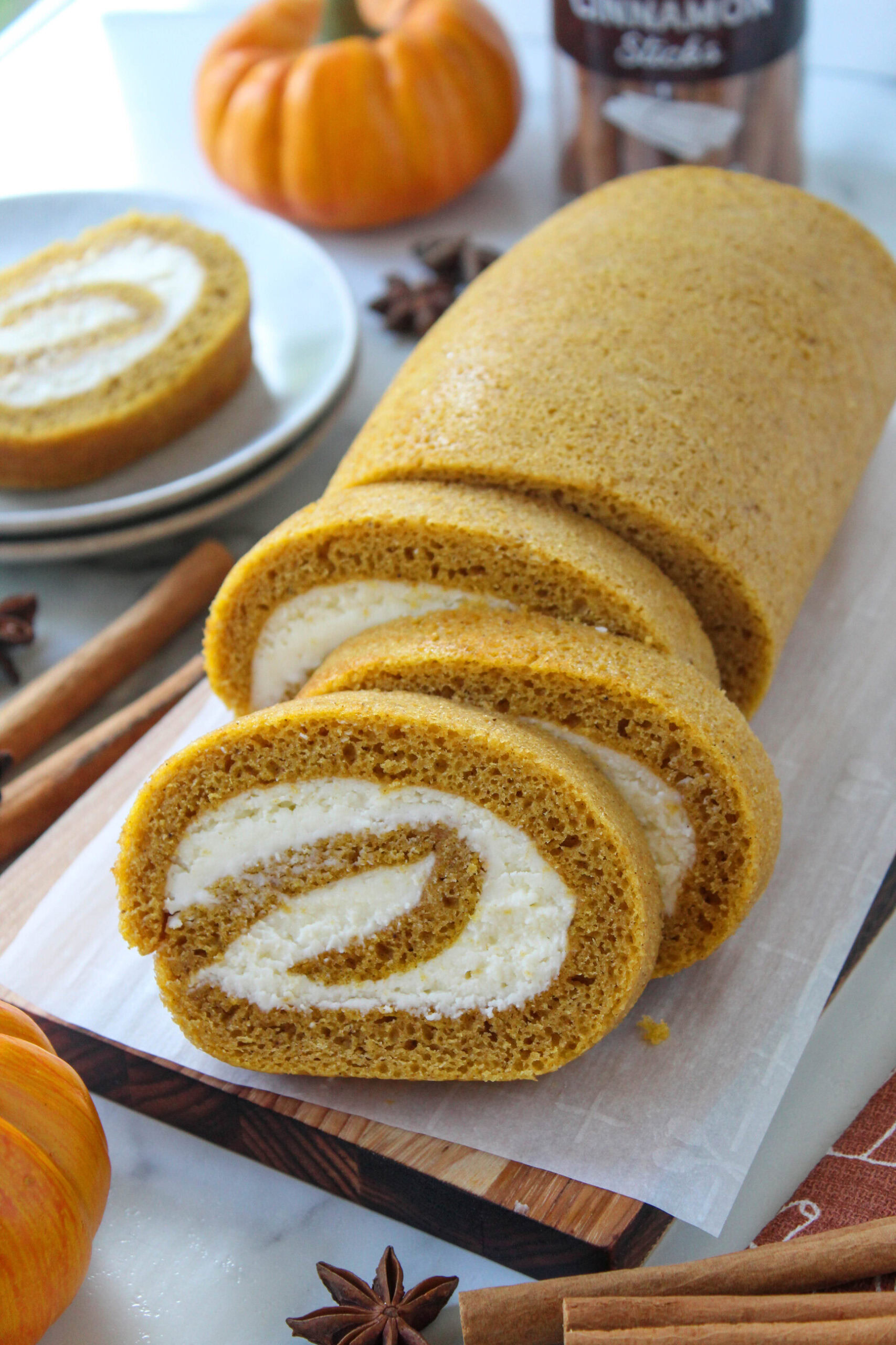 Soft pumpkin roll with a silky cream cheese layer rolled inside