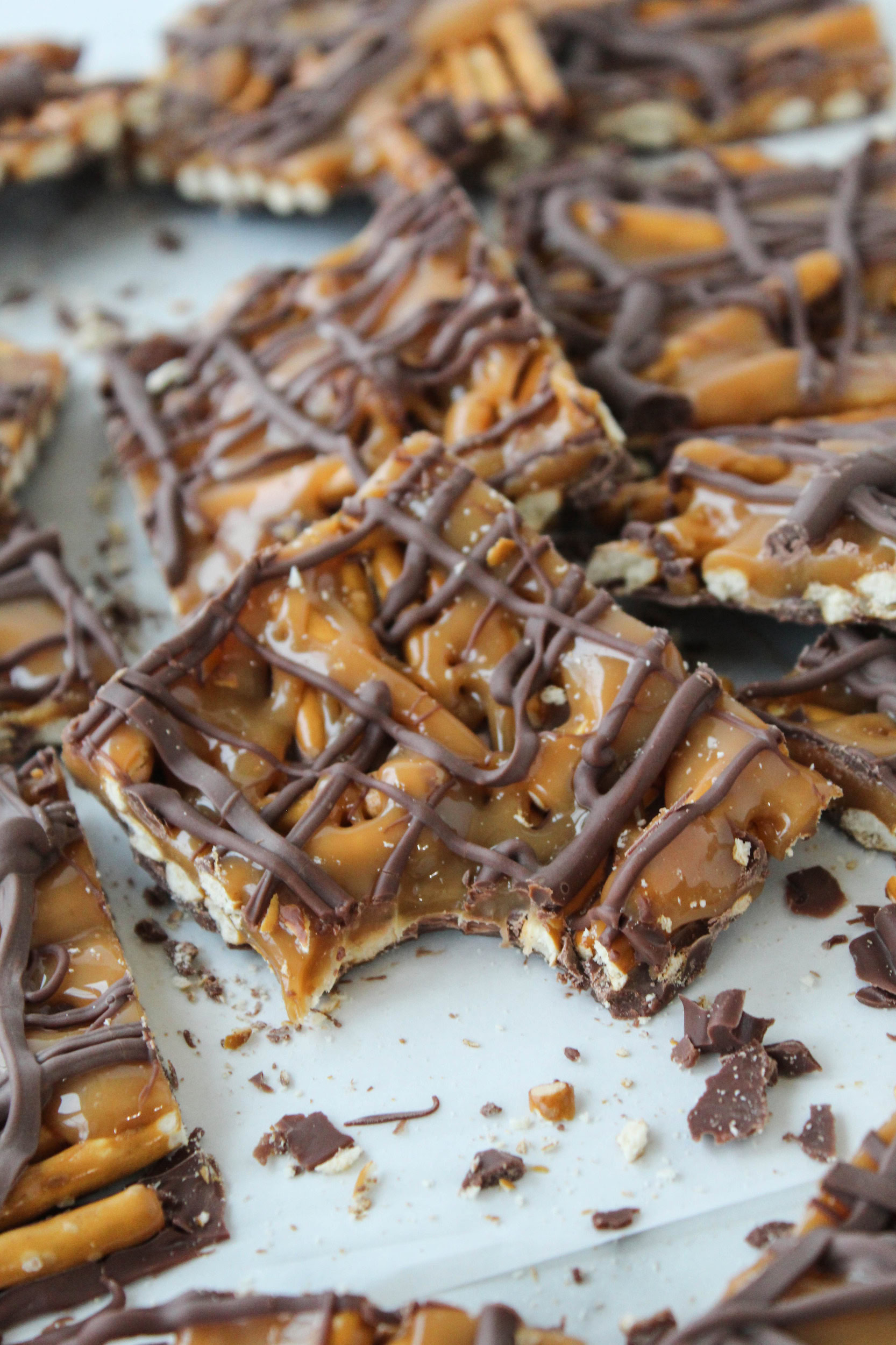 sweet and salty pretzel bark with salted caramel and melted chocolate layers