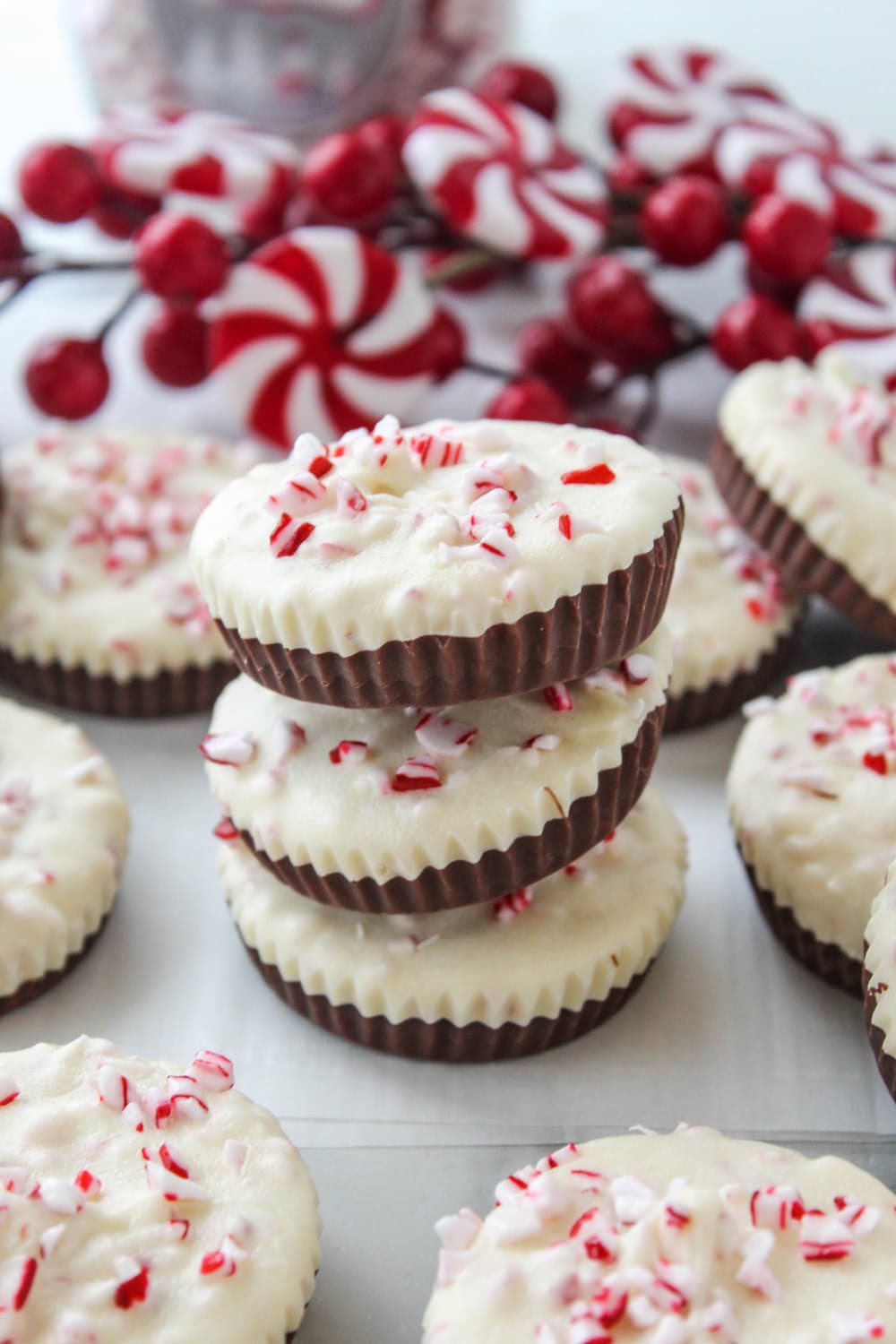 Peppermint bark cups topped with crushed candy canes