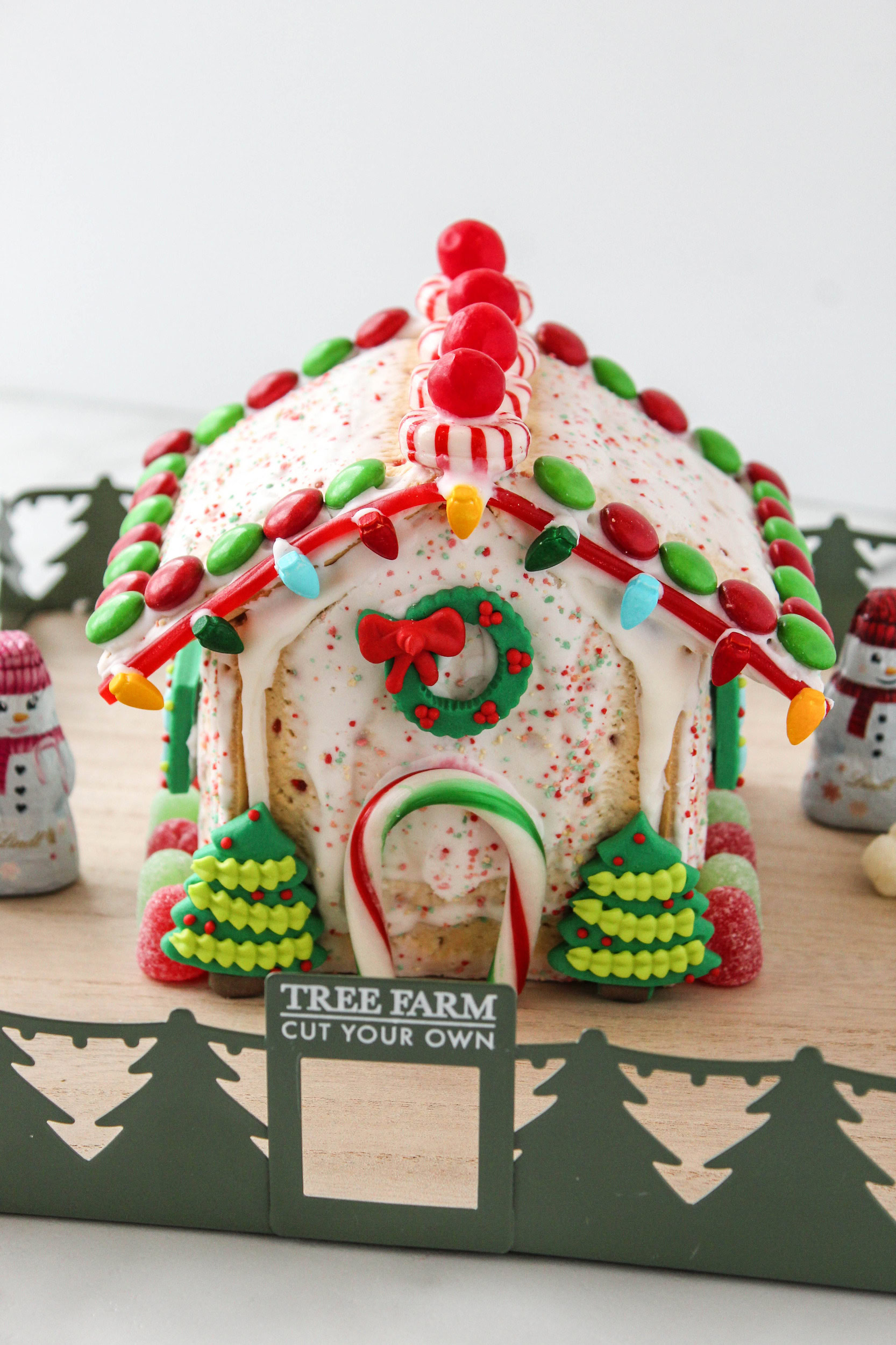 Pop-Tart gingerbread house decorated with icing and colorful candy