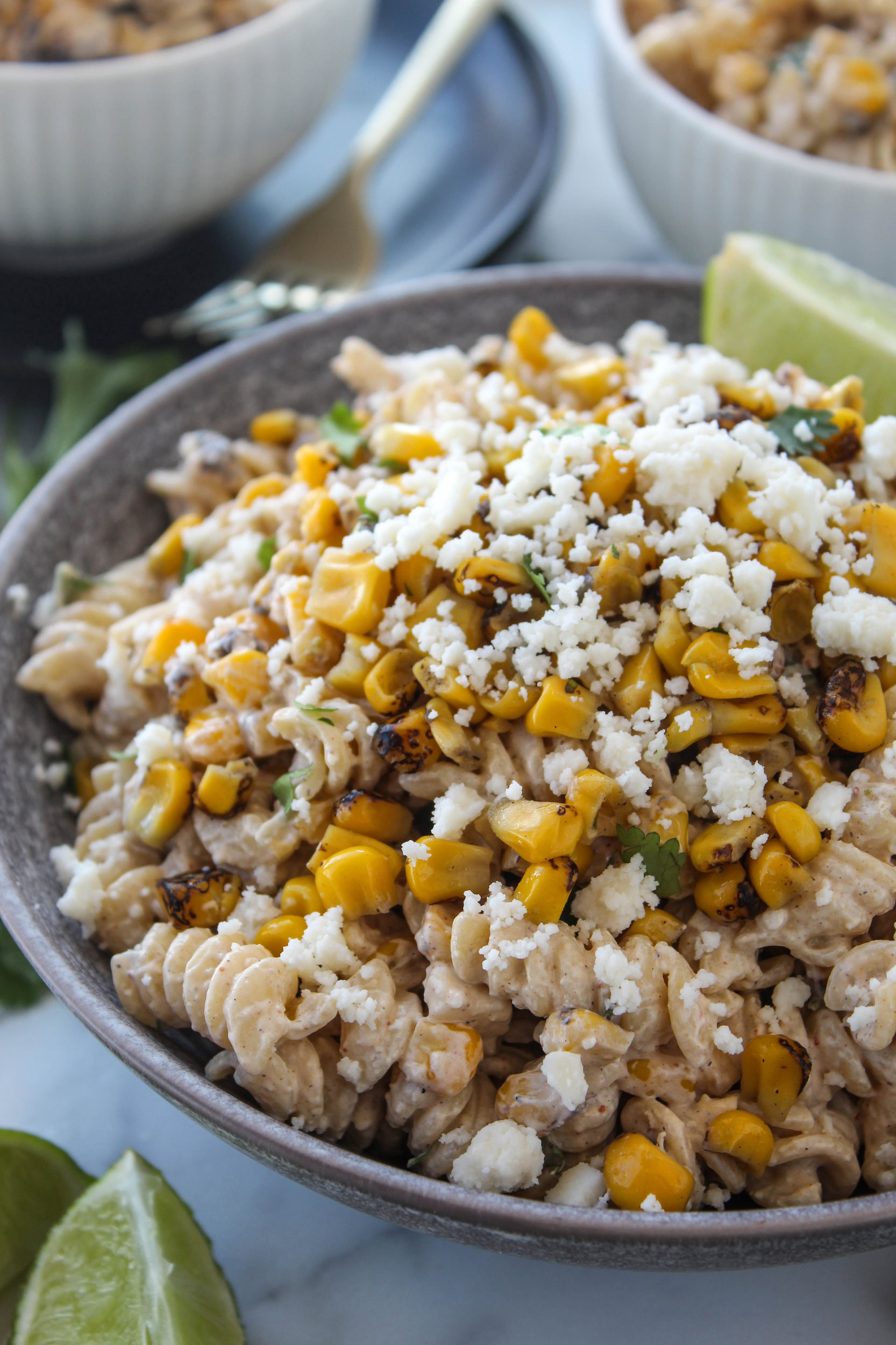 Mexican street corn pasta salad with corn, pasta, and cilantro