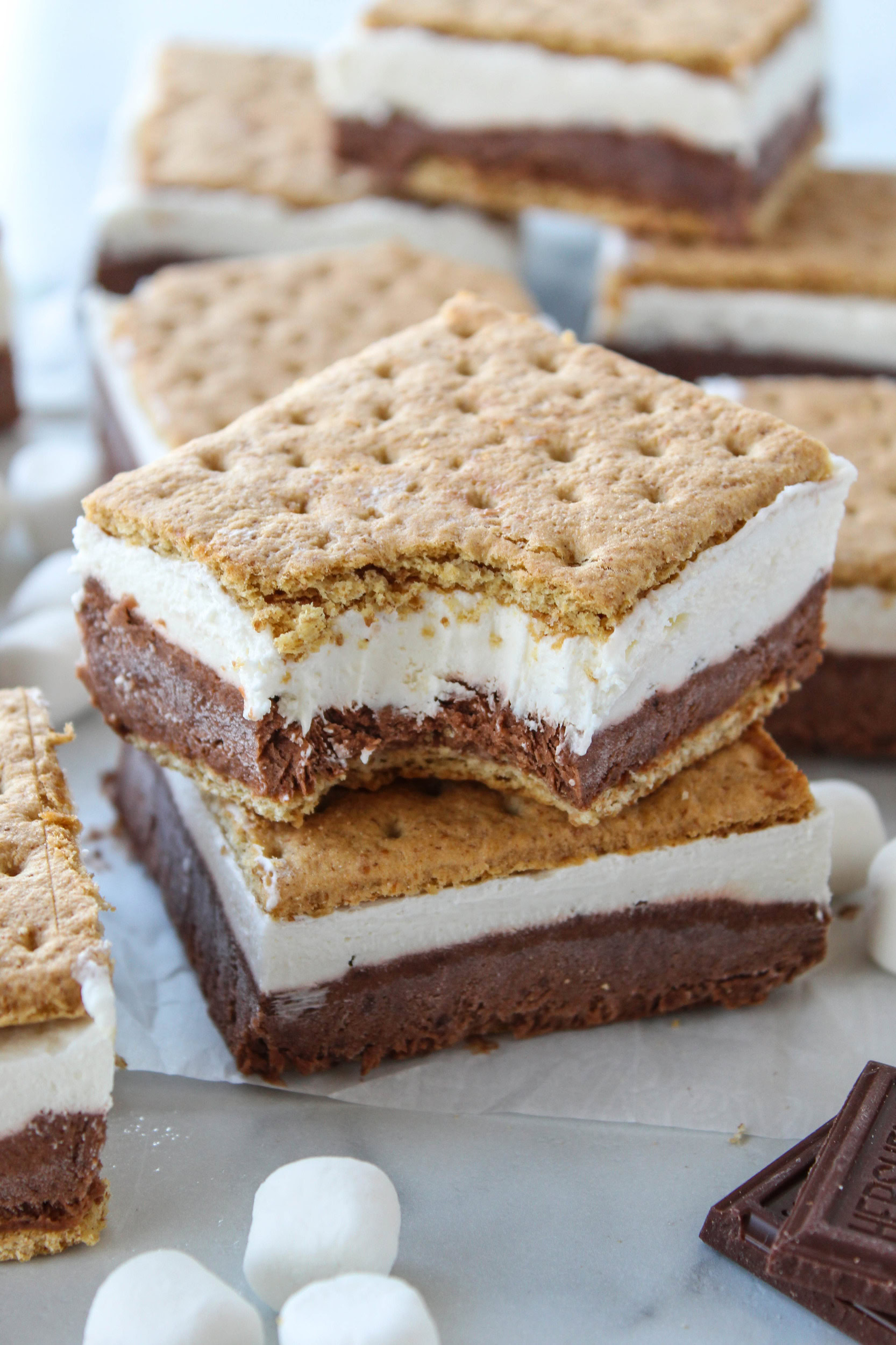 No-bake frozen s’mores recipe with creamy marshmallow filling, chocolate layer, and graham cracker crust