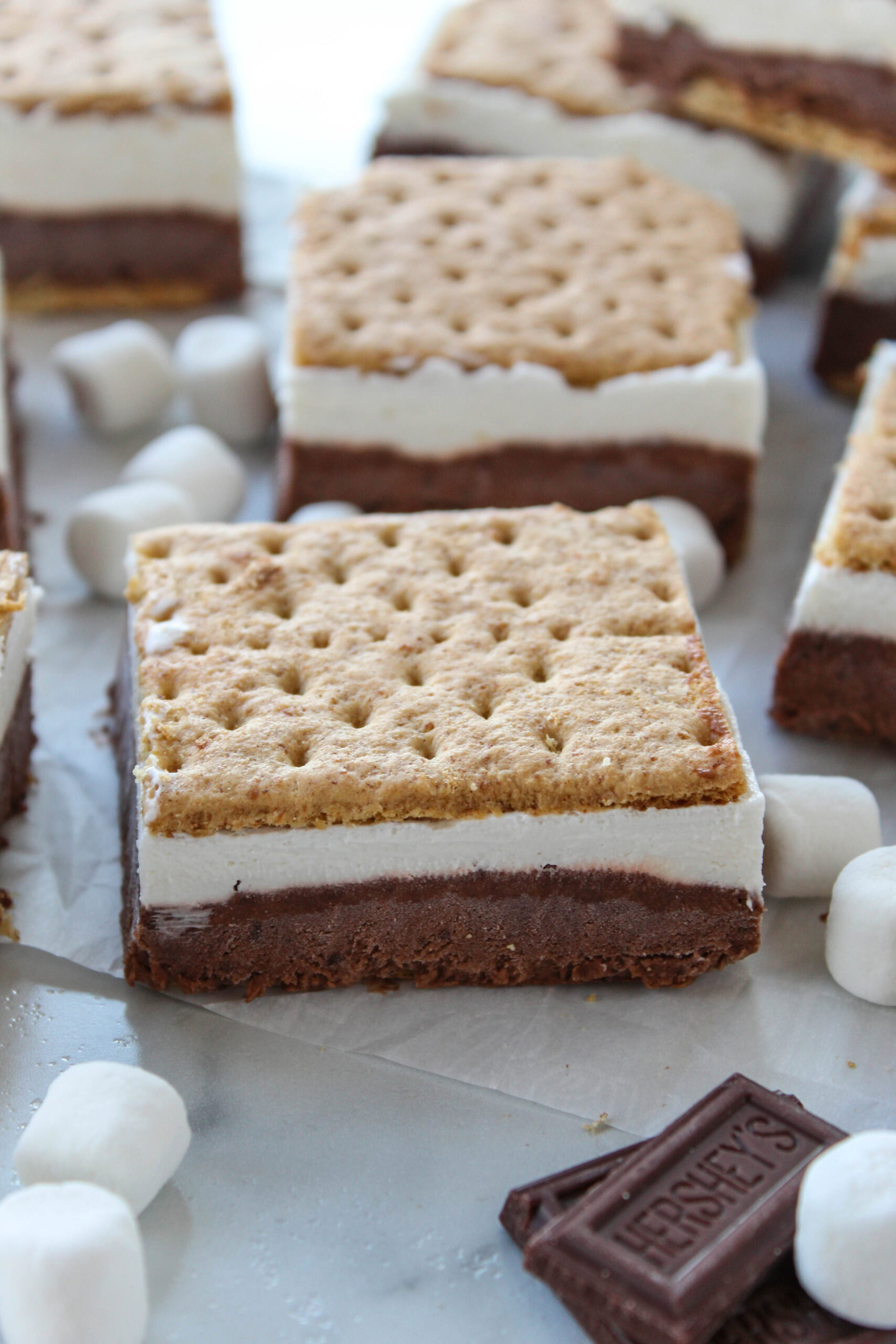 Easy frozen s’mores dessert bars made with graham crackers, chocolate, and fluffy marshmallow cream