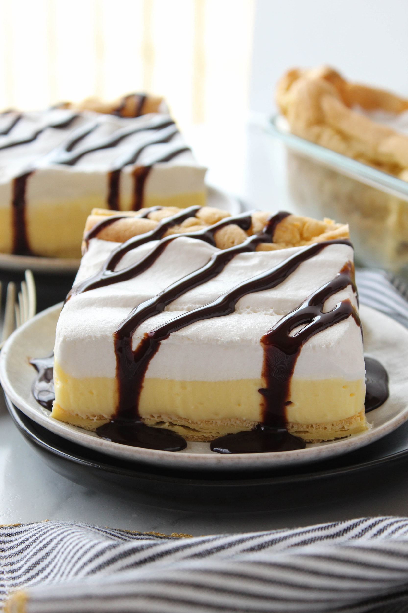 Cream puff cake sliced and ready to serve