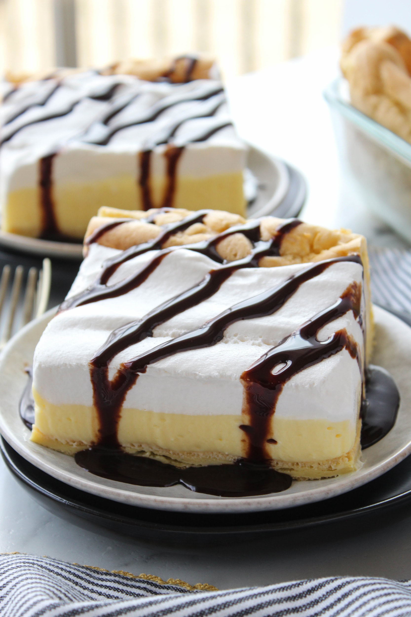 Close‑up of cream puff cake showing creamy vanilla filling