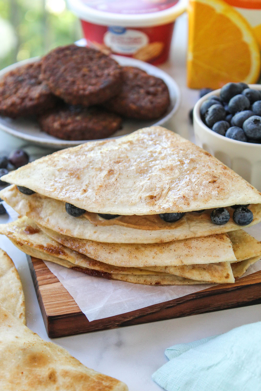 Sweet blueberry breakfast quesadilla with a crunchy tortilla exterior