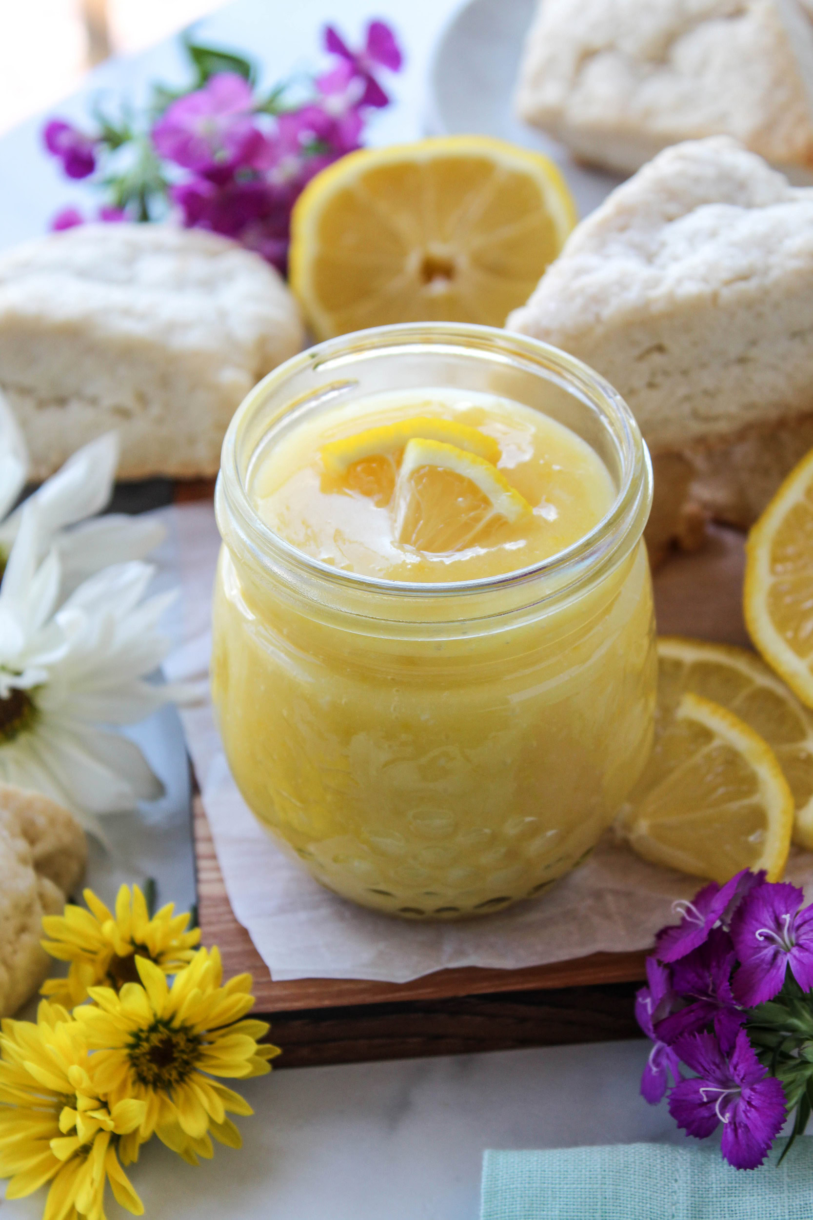 Thick lemon curd with bright yellow color and glossy texture