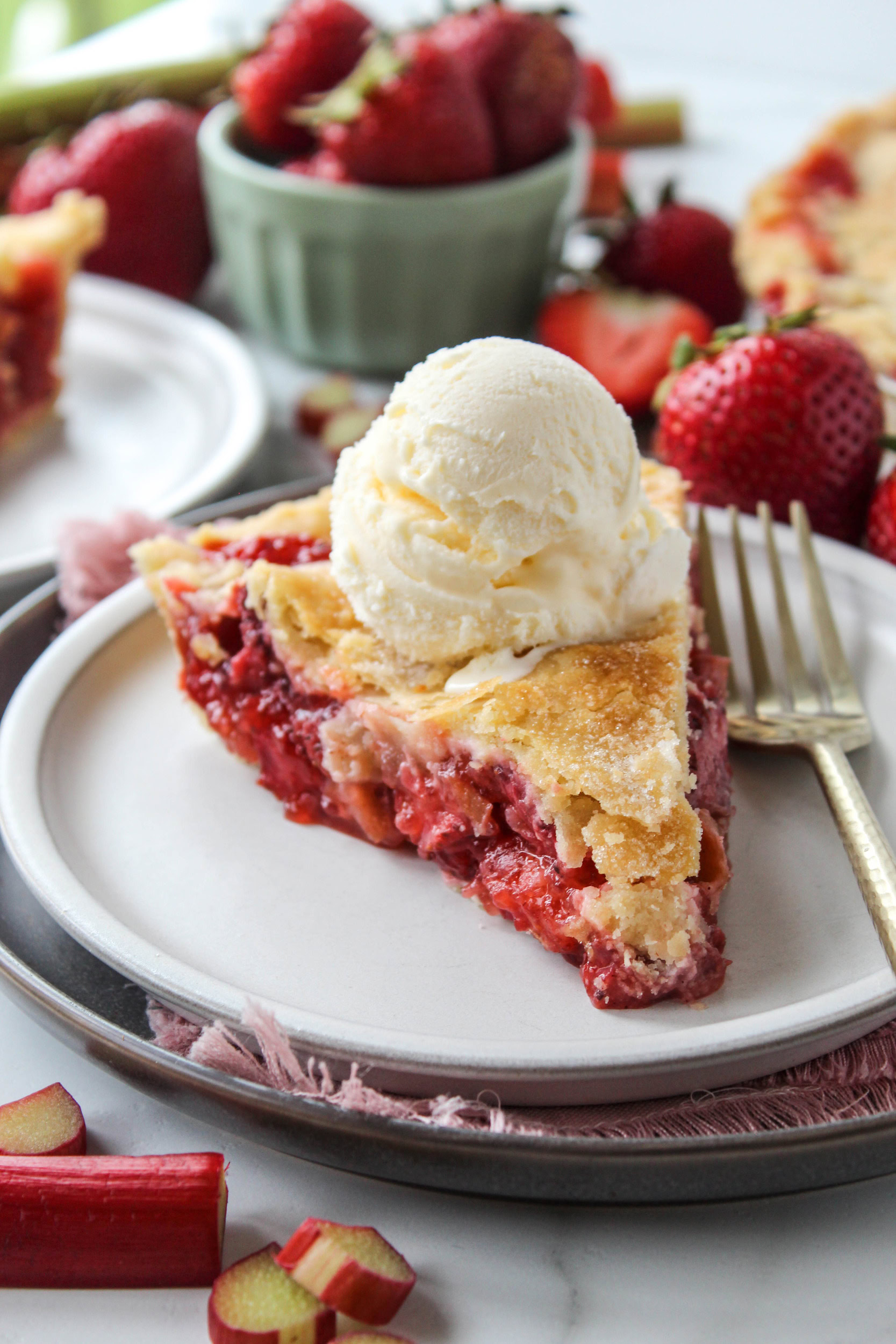 Classic strawberry rhubarb pie with sweet‑tart fruit filling and golden crust