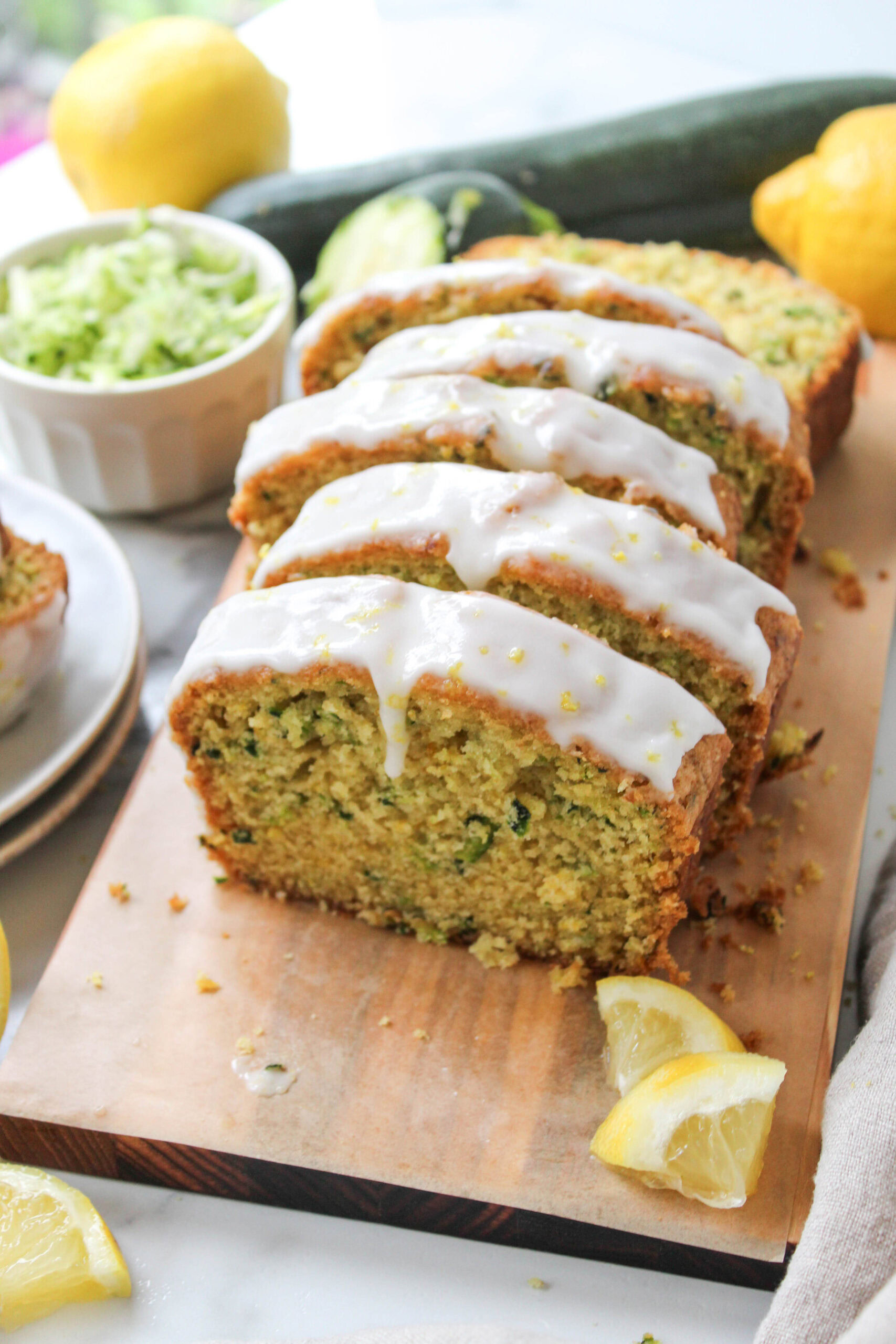 Homemade glazed lemon zucchini bread with a tender crumb and bright citrus flavor