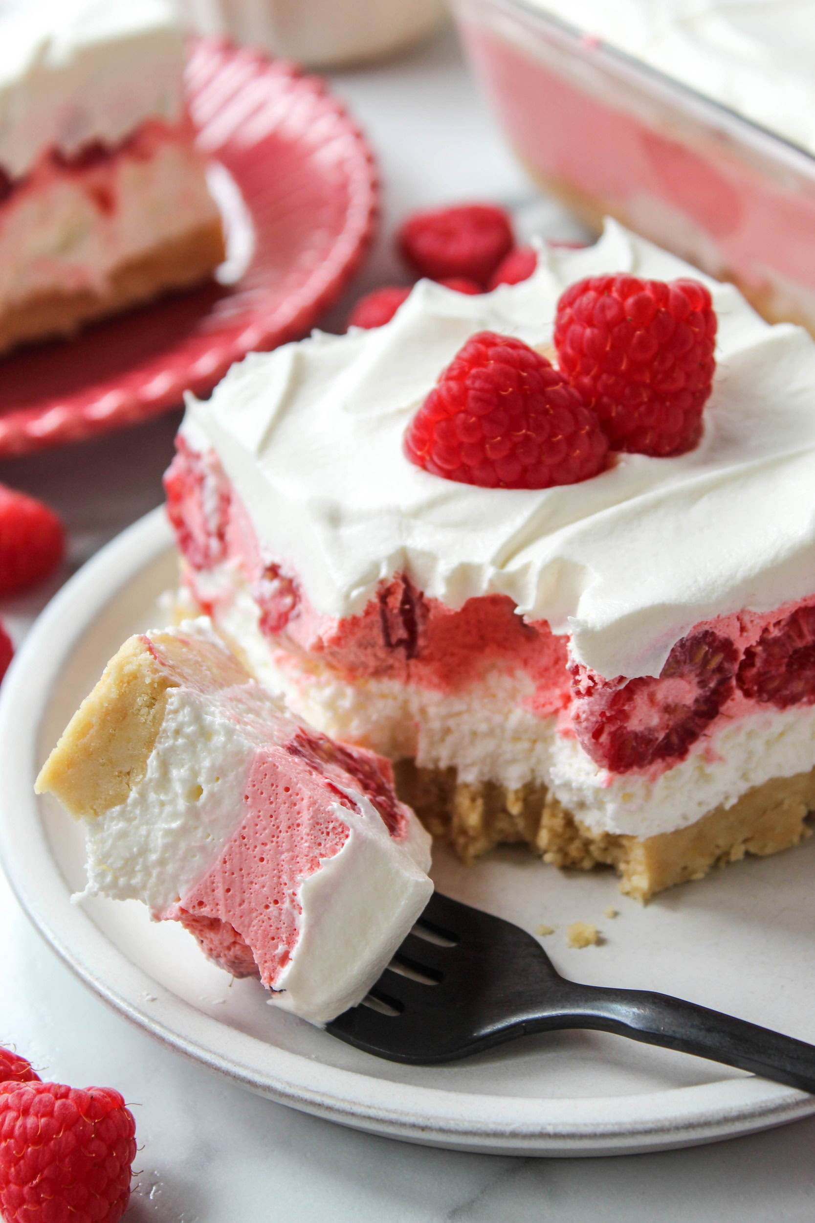 Summer raspberry lasagna dessert perfect for parties and potlucks