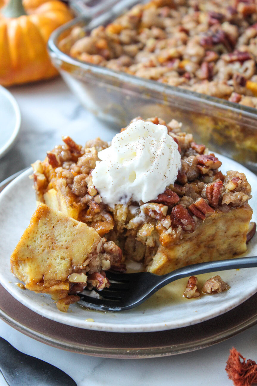 Homemade pumpkin French toast casserole topped with a cinnamon crumble