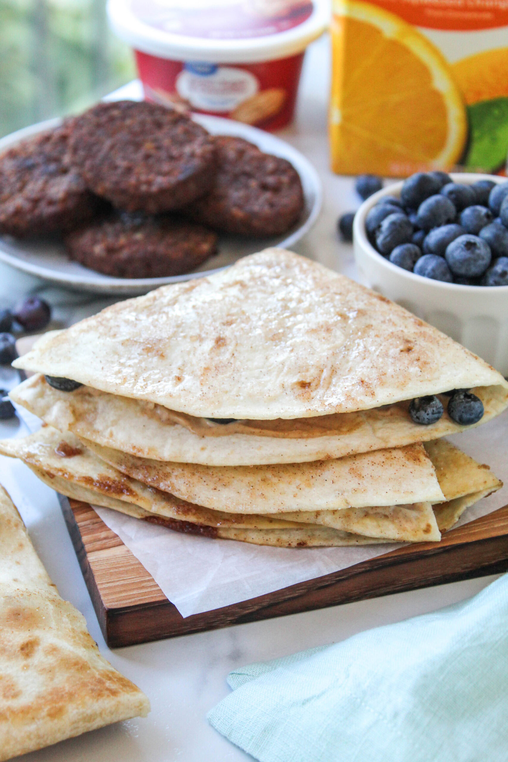Homemade blueberry quesadilla cut into triangles for breakfast