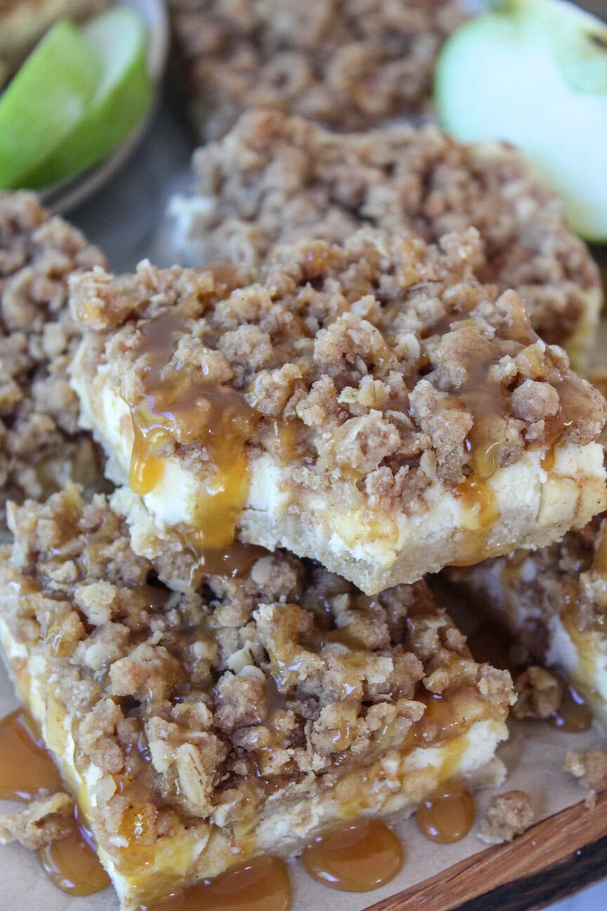 Gooey caramel apple cheesecake bars with crunchy streusel topping
