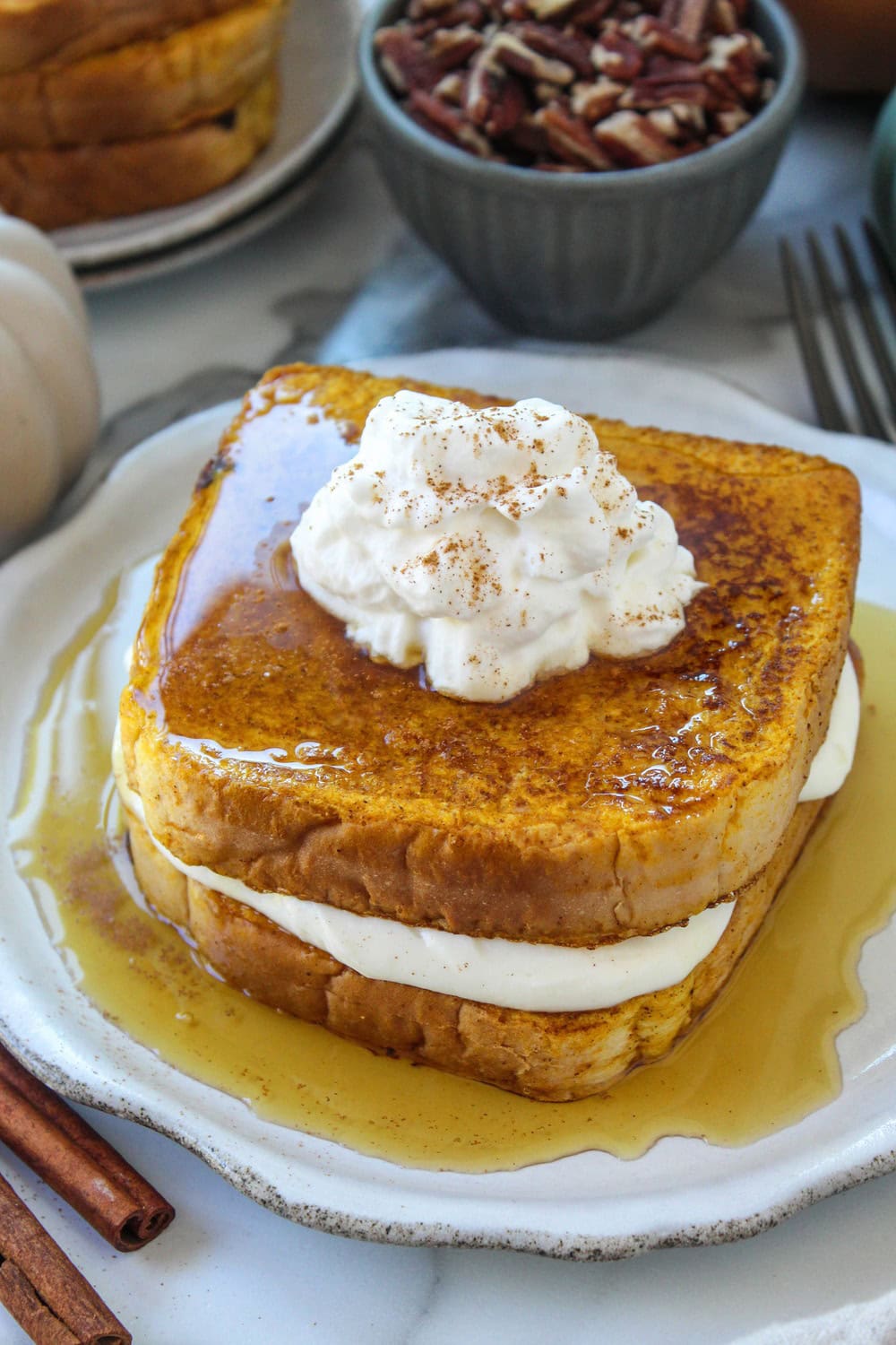 Overhead shot of pumpkin French toast with whipped cream