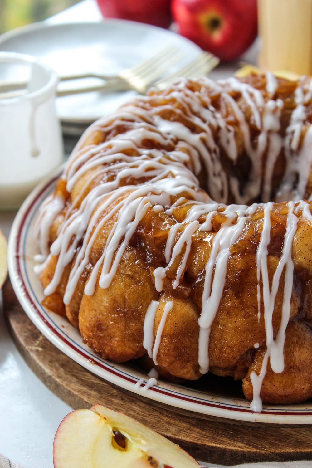 Apple fritter monkey bread topped with sweet vanilla glaze