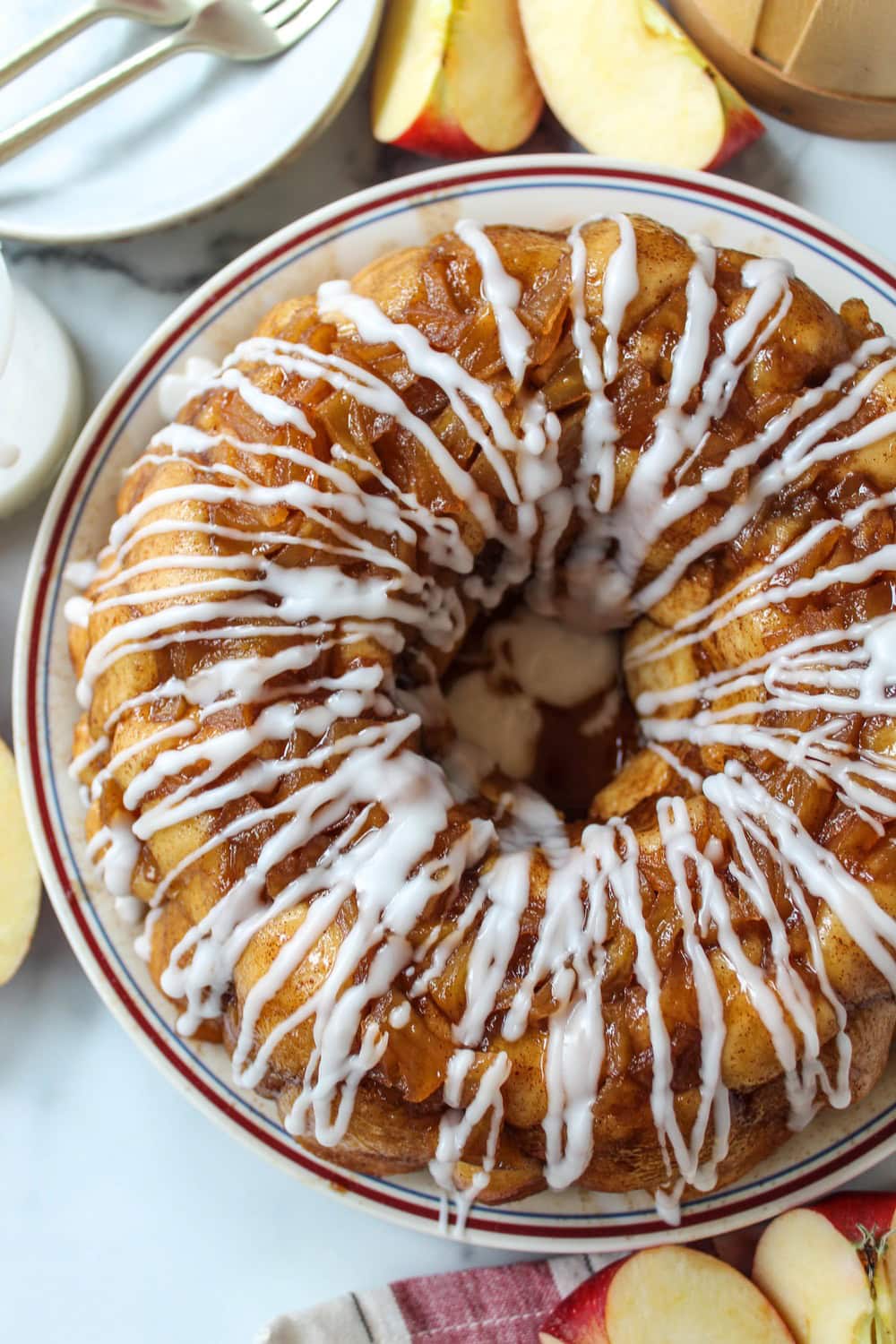 Close-up of gooey apple fritter monkey bread with glaze