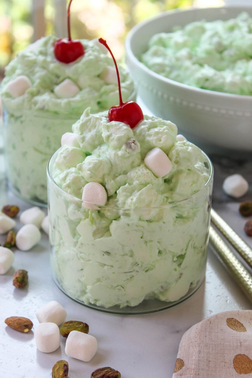 Creamy pistachio fluff salad with crushed pineapple and pastel green color