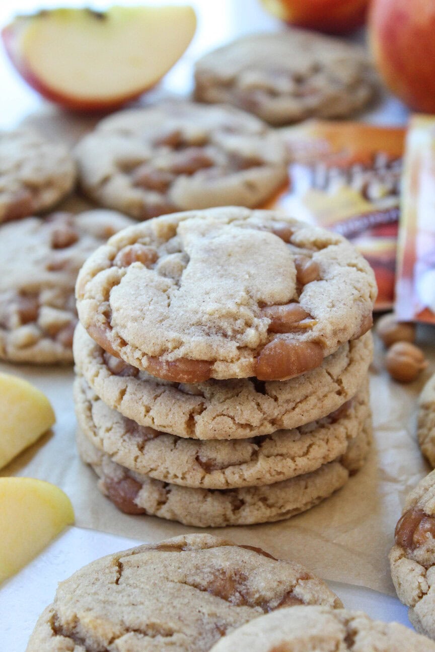 Stack of soft caramel apple cider cookies made with apple cider mix and caramel bits