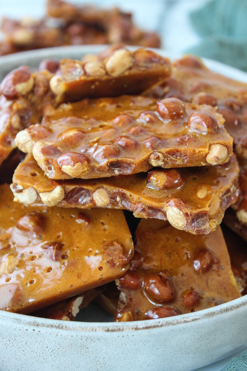 Homemade peanut brittle snapped into irregular shards