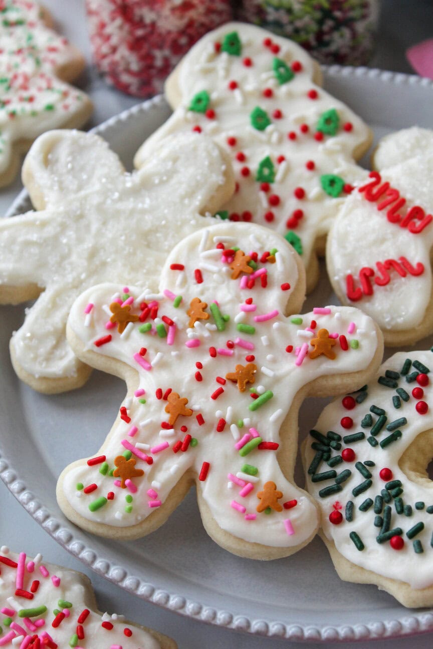 The best Christmas cutout sugar cookies decorated with icing and sprinkles
