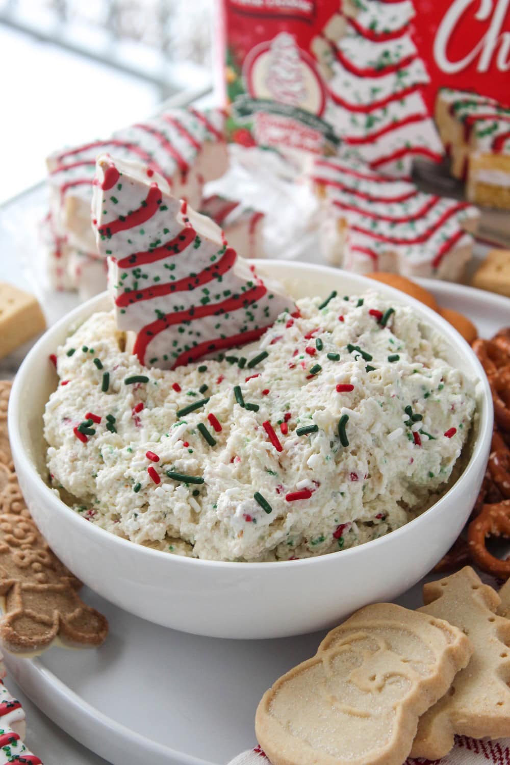 Creamy Little Debbie Christmas Tree Cake dip served in a bowl with sprinkles