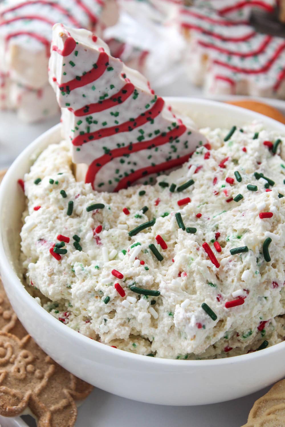 Festive Little Debbie Christmas Tree Cake dip with colorful holiday sprinkles