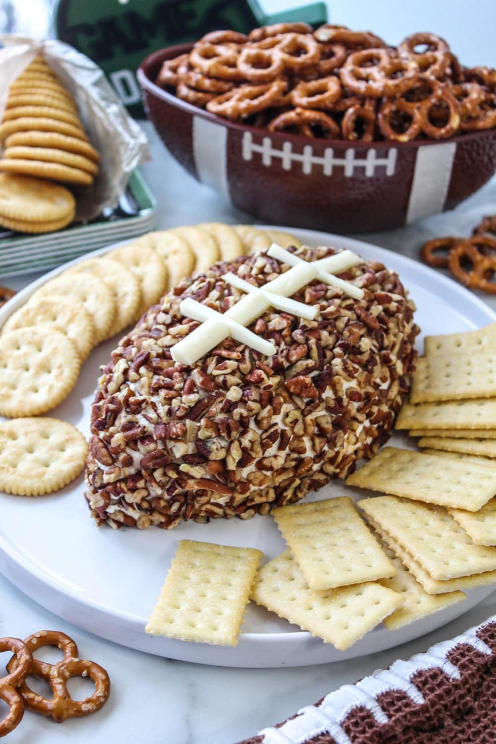 Party cheeseball shaped like a football with white icing laces
