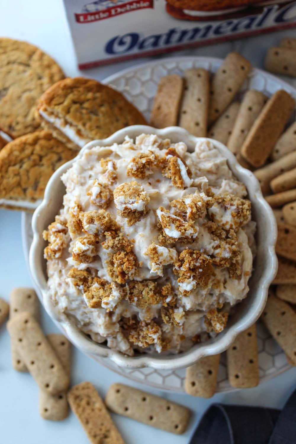 Little Debbie Oatmeal Cream Pie dessert dip topped with crumbled oatmeal cookies