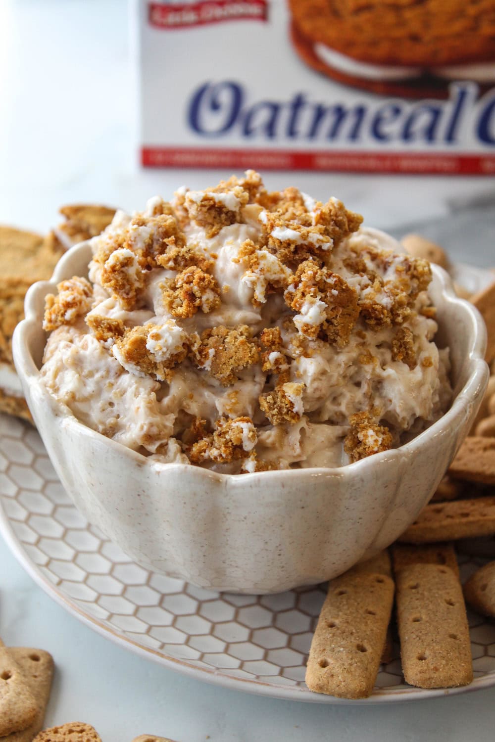 Creamy oatmeal cream pie dessert dip served in a white bowl