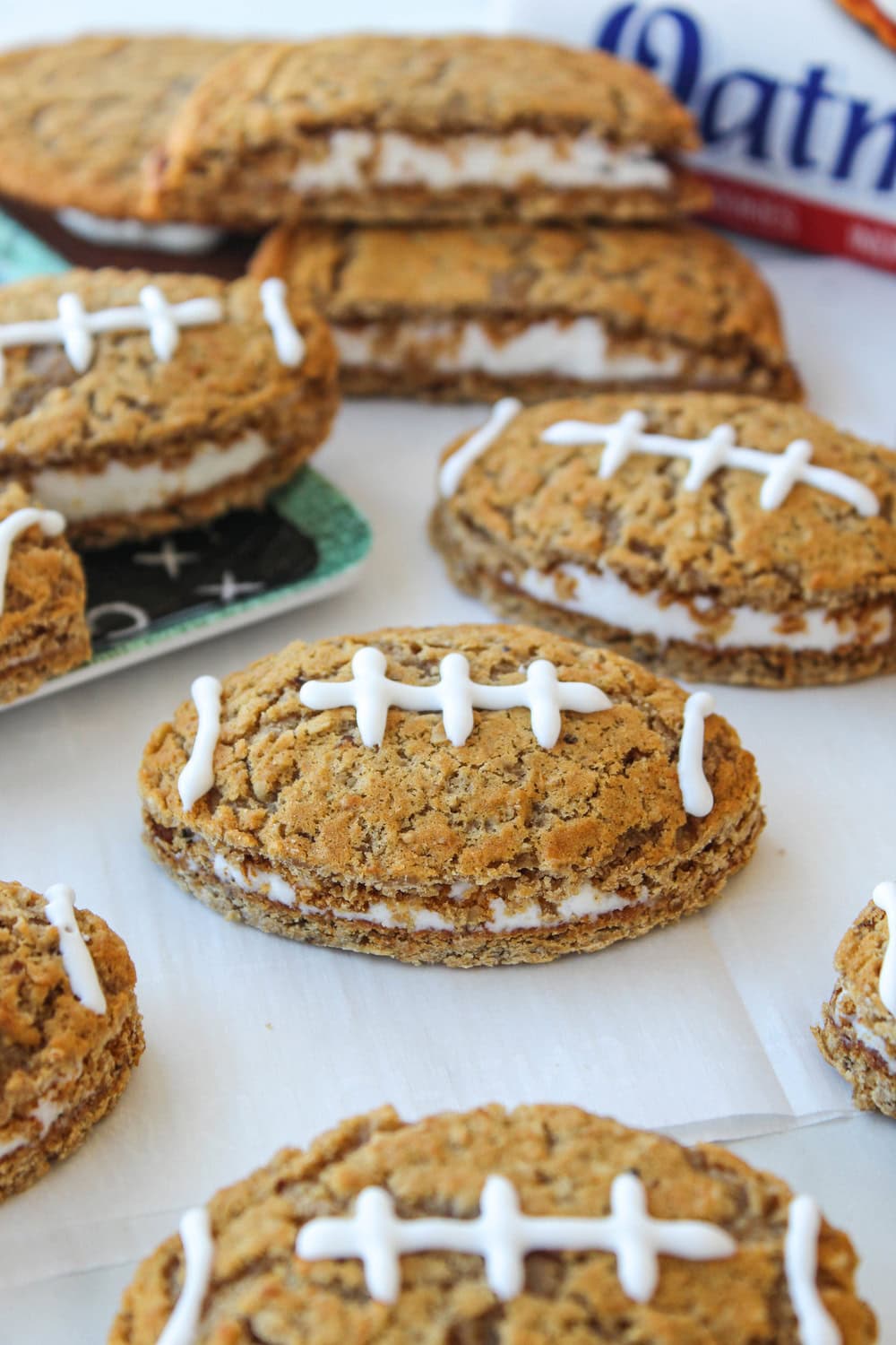 Football‑shaped oatmeal creme pies with white icing laces