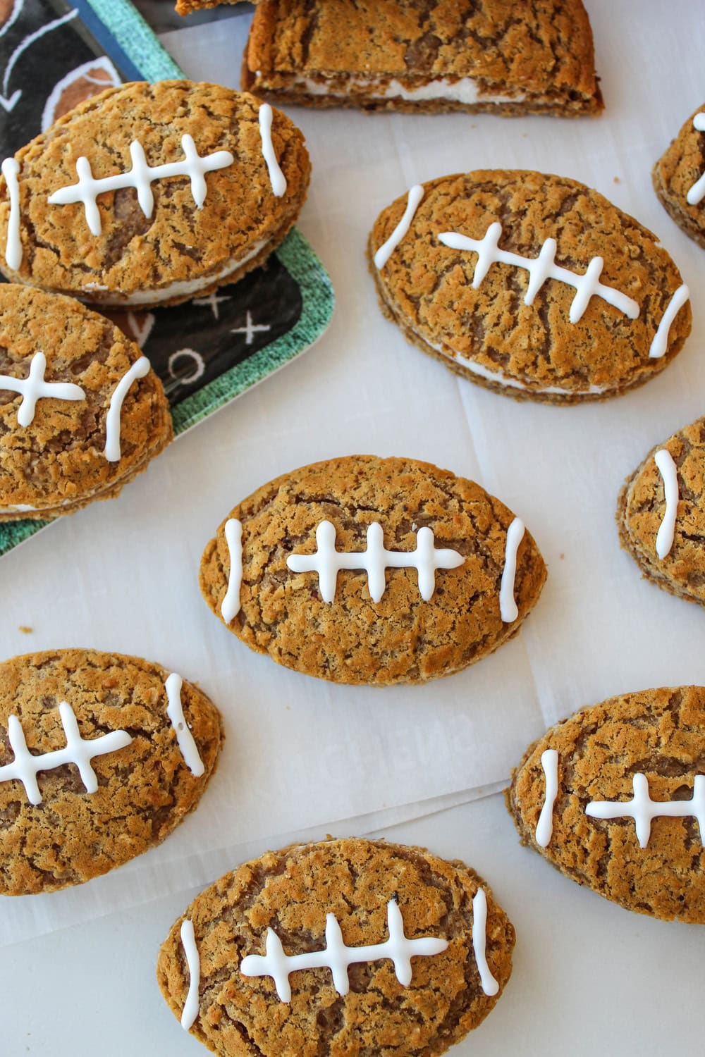 Soft oatmeal creme pies shaped like footballs with piped laces