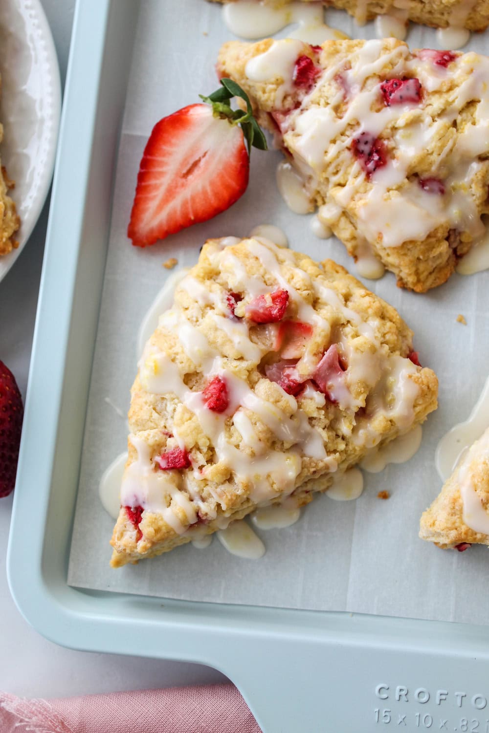 Freshly baked strawberry lemon scones with bright citrus glaze