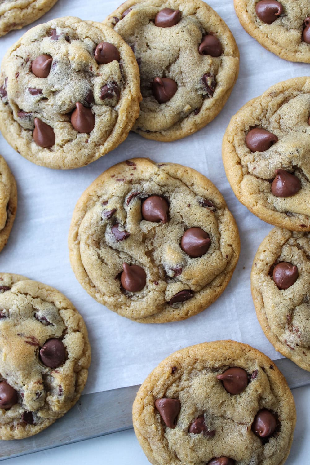 Close‑up of a chewy chocolate chip cookie showing a soft, gooey center.