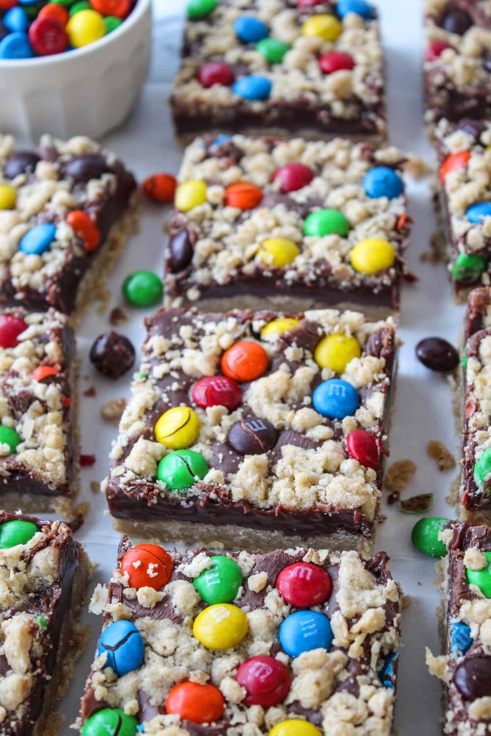 Chocolate oat bars topped with colorful M&M candies