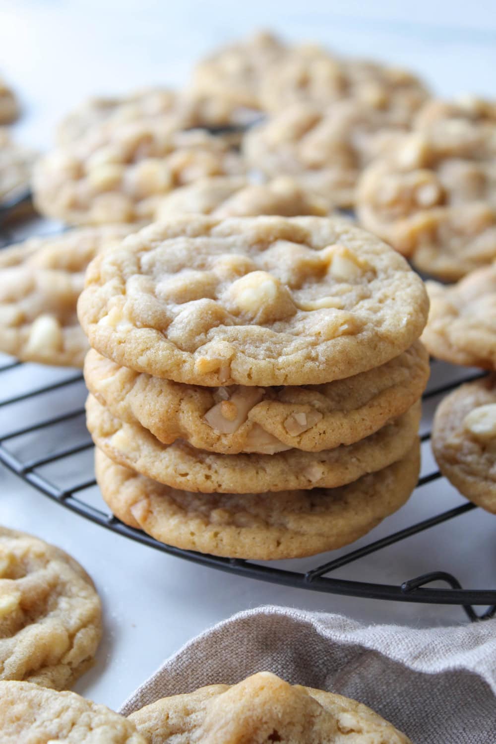 Chewy white chocolate macadamia cookies with chunks of white chocolate and nuts