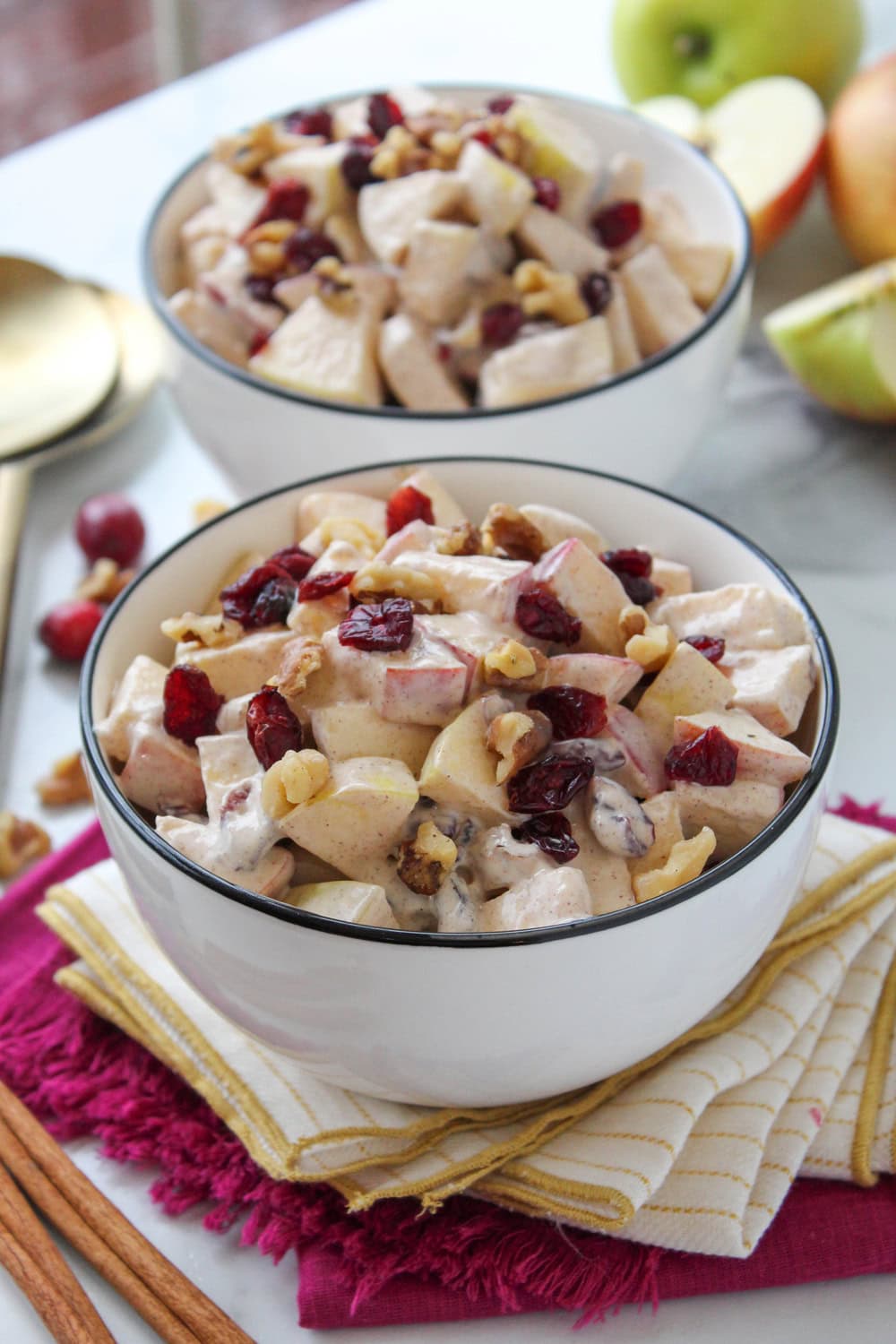 Creamy apple cinnamon salad with fresh apples, walnuts, and a cinnamon dressing