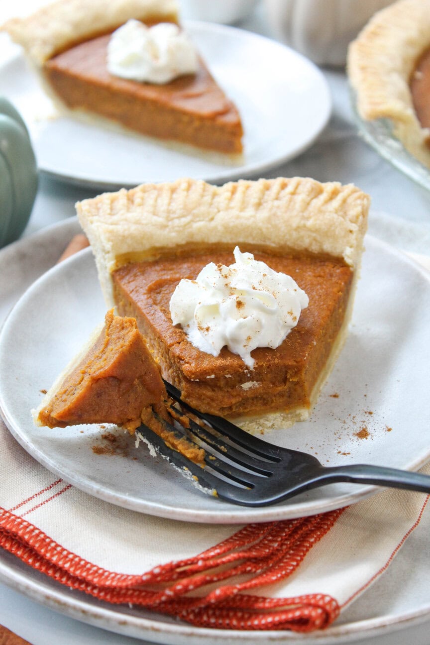 Classic vegan pumpkin pie baked in a golden pie crust