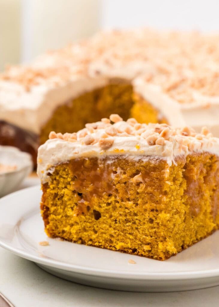 This Pumpkin Poke Cake With Caramel Whipped Cream Will Change Your Life